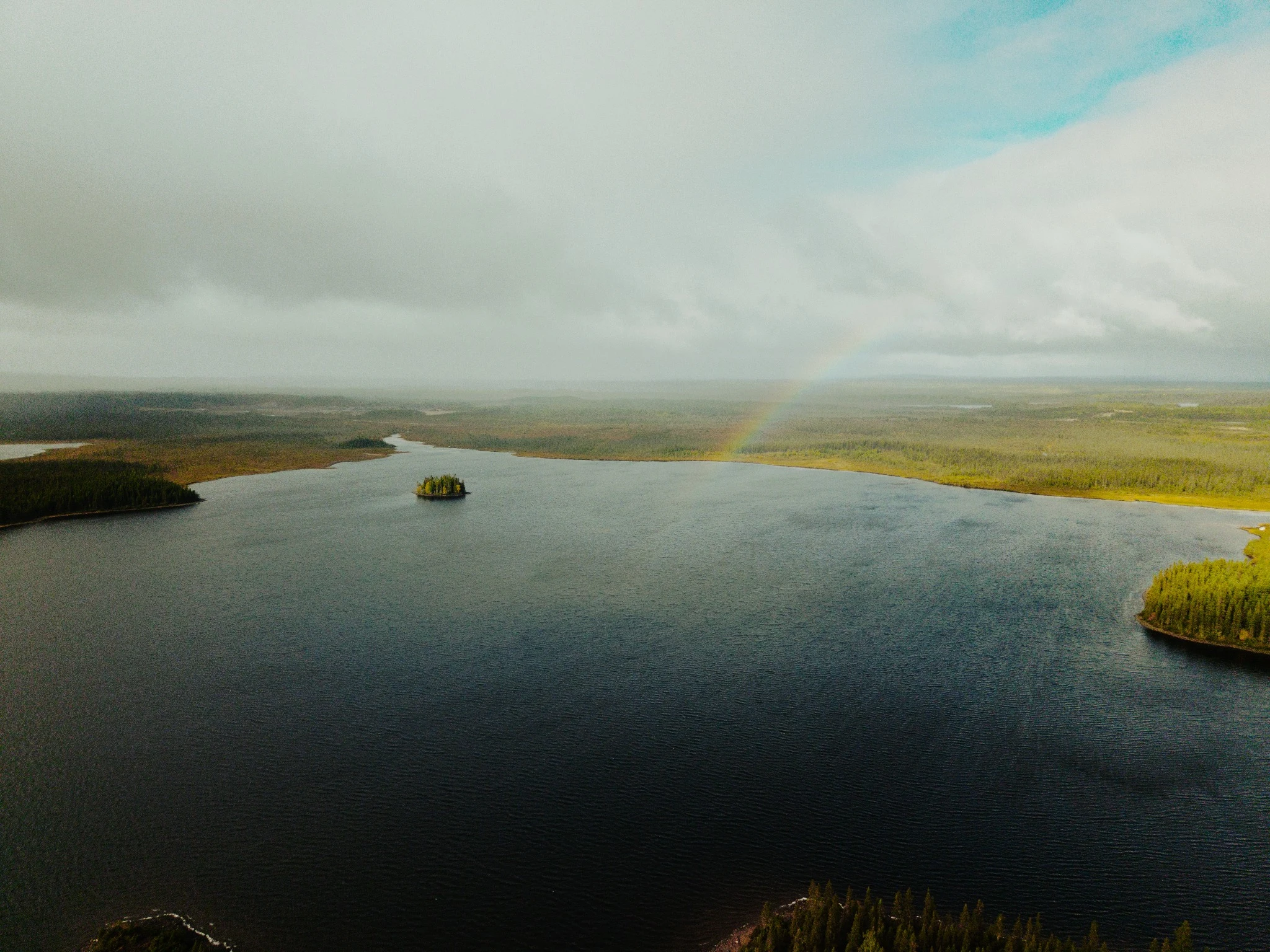 Rainbow over a northern lake